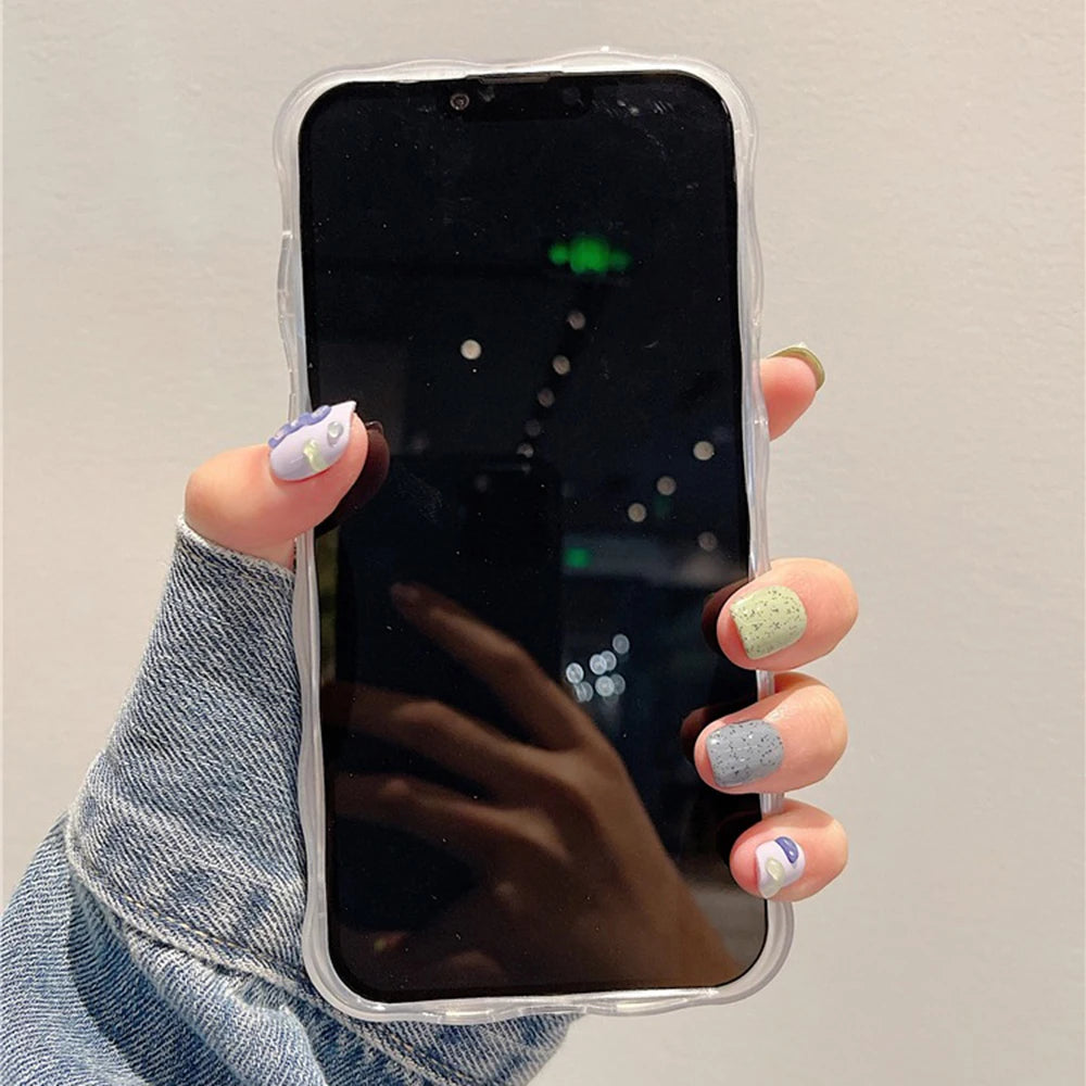 Hand holding a smartphone with a kawaii design against a plain background