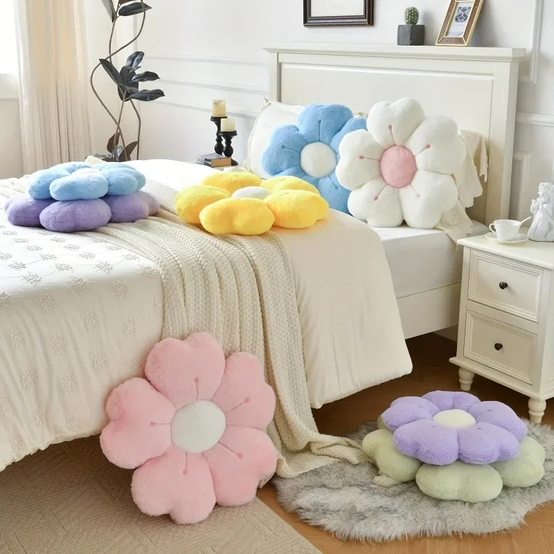 Colorful flower-shaped kawaii cushions on a bed in a bedroom setting.