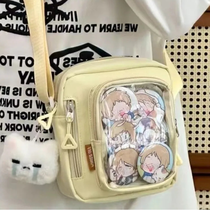 Beige Kawaii crossbody bag with cartoon character design on a white background