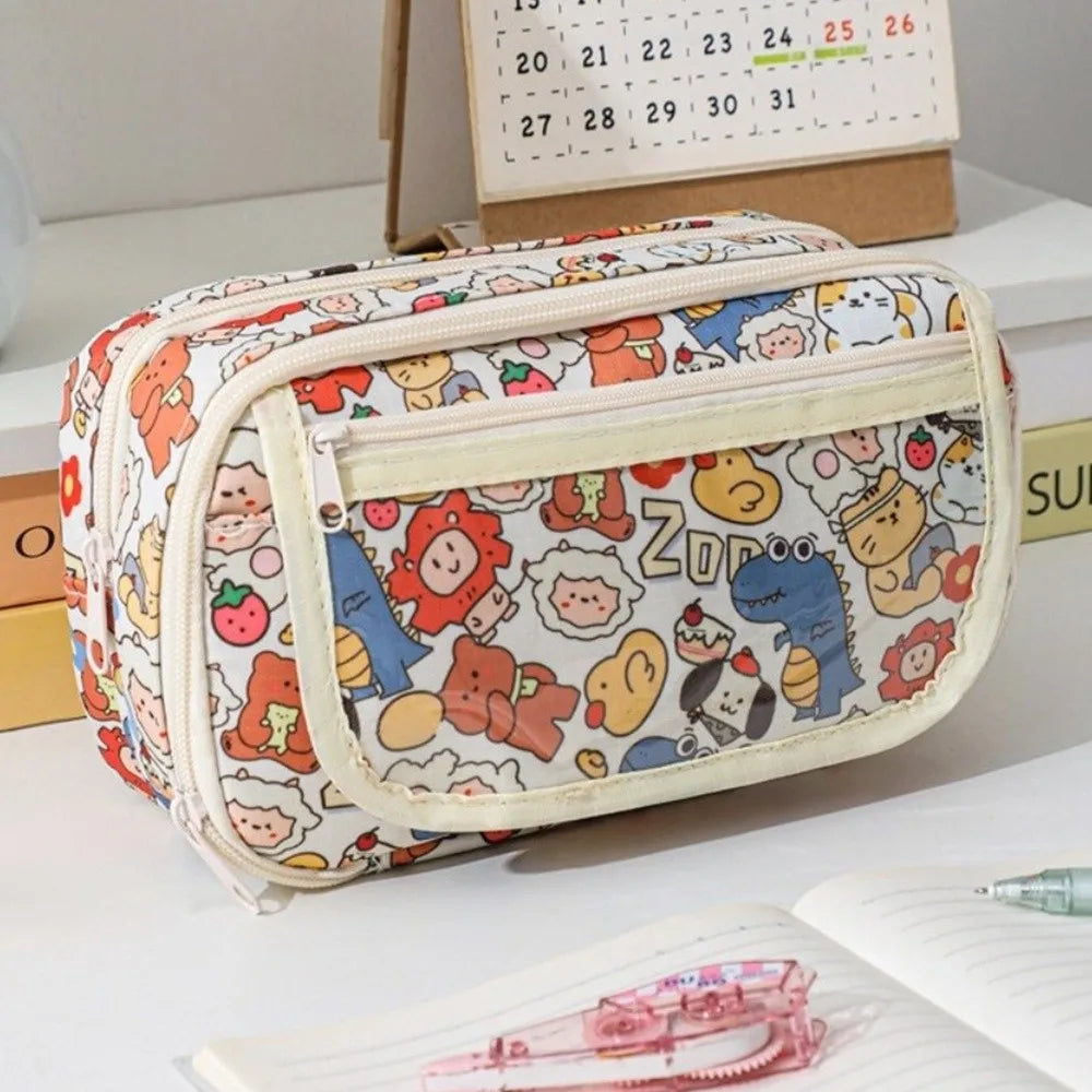 Pencil case with kawaii cartoon character design on a desk with stationery items
