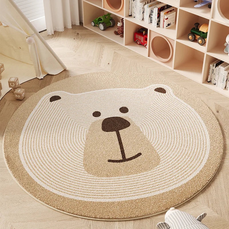Round bear-shaped kawaii rug on a wooden floor with children's toys and books in the background.