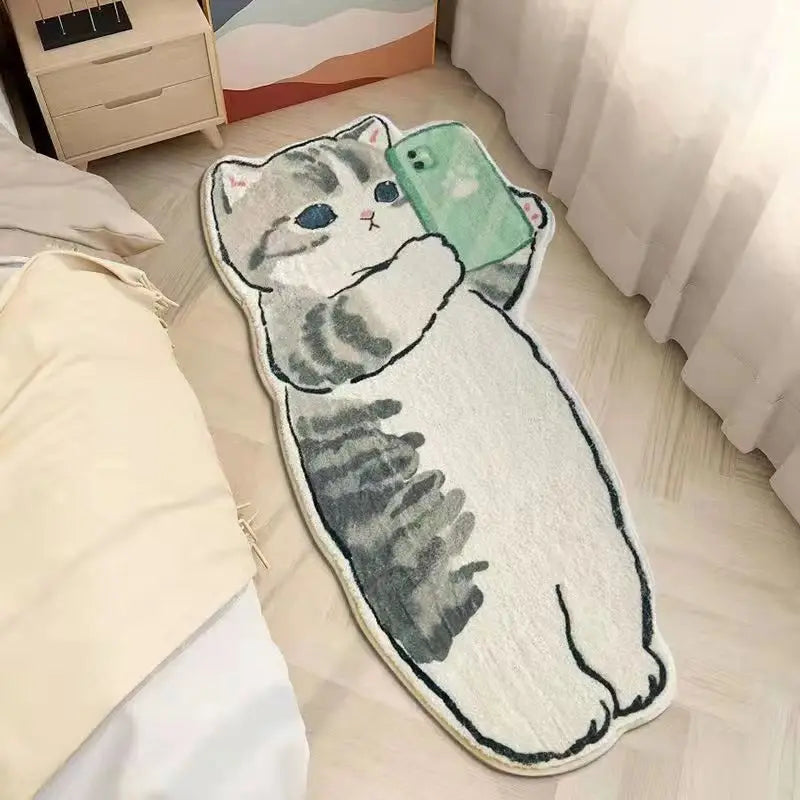 Kawaii cat-shaped rug with a phone on a bed