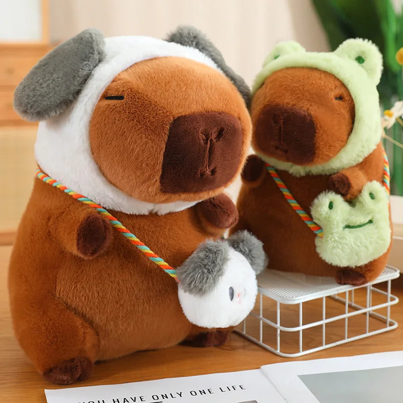 Two brown kawaii plush toys with animal ears on a wooden surface.