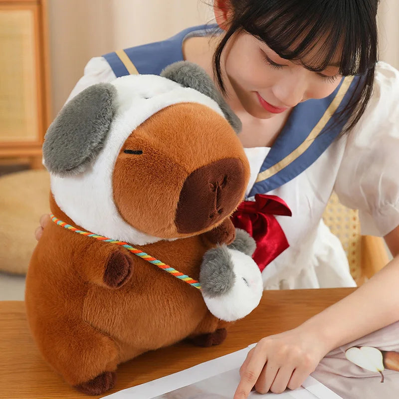 Person in a school uniform hugging a large kawaii plush dog toy on a wooden table.