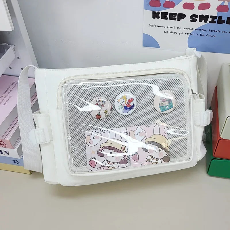 White pouch with Kawaii cartoon designs on a white surface