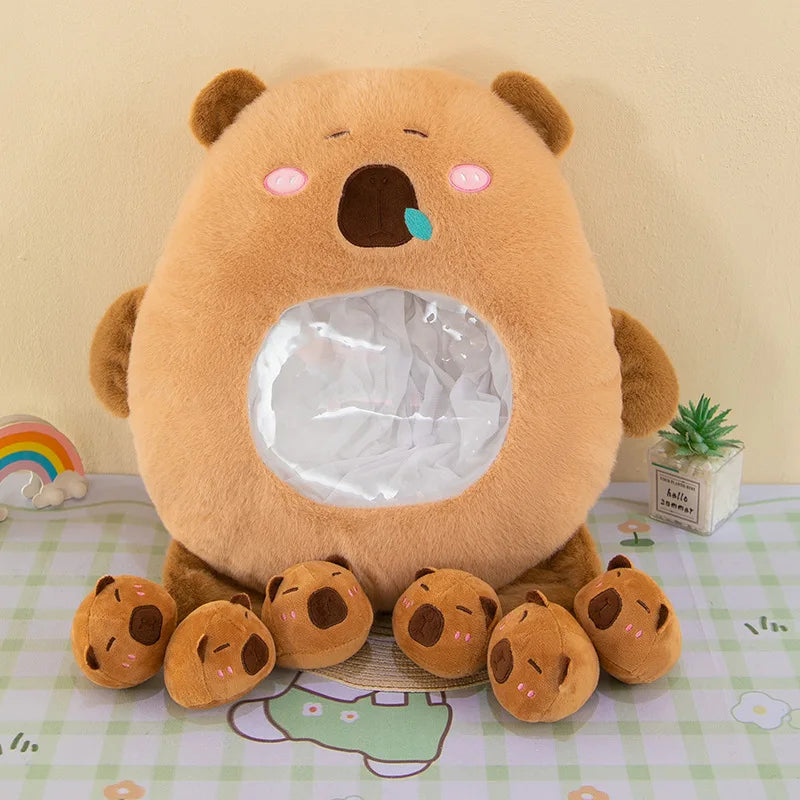 Kawaii plush toy bear with a transparent window on a checkered tablecloth