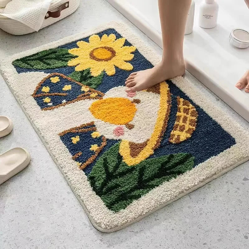 Decorative Kawaii bath mat with a sunflower, egg, and waffle design on a bathroom floor.