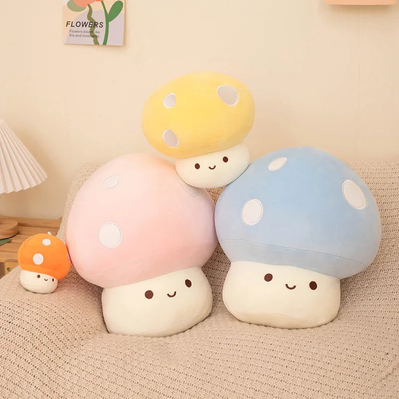 Set of colorful mushroom-shaped plush kawaii toys on a textured surface.