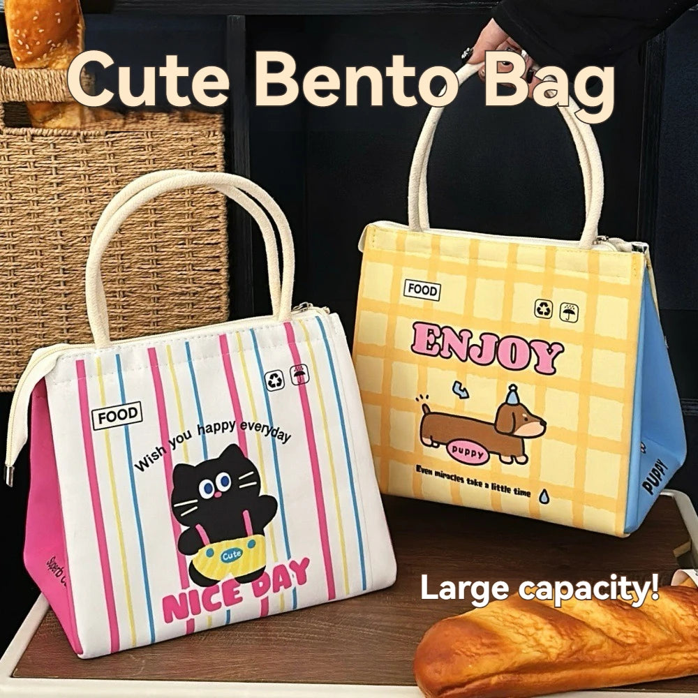 Two kawaii bento bags with cartoon designs on a wooden surface.