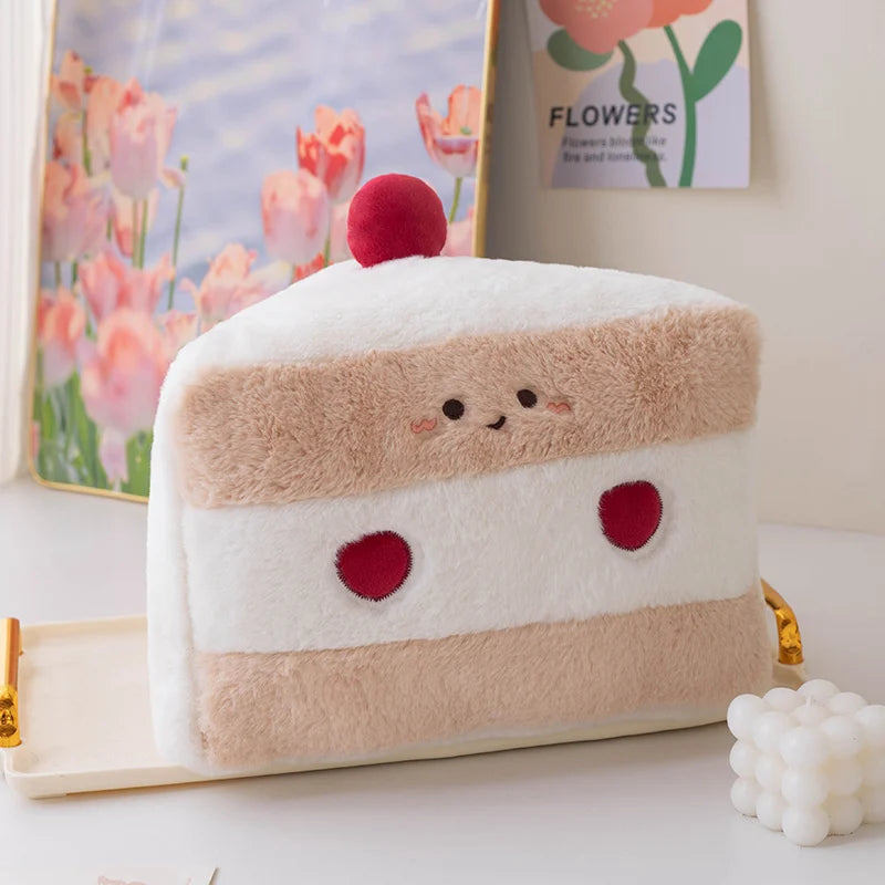 Cute kawaii plush toy resembling a cake with cherry toppings on a white surface.
