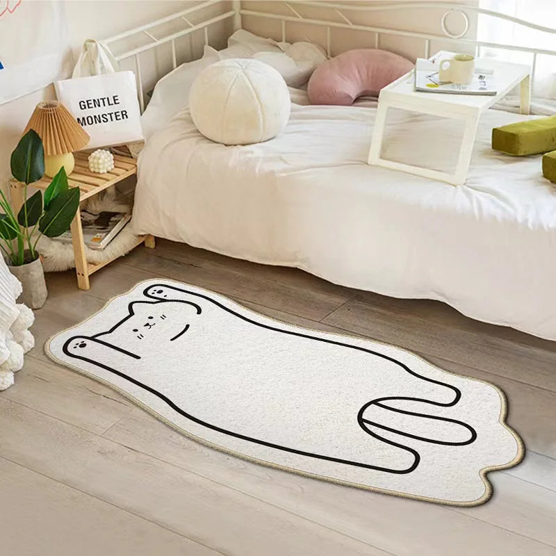 White kawaii rug with black design on a wooden floor in a bedroom setting