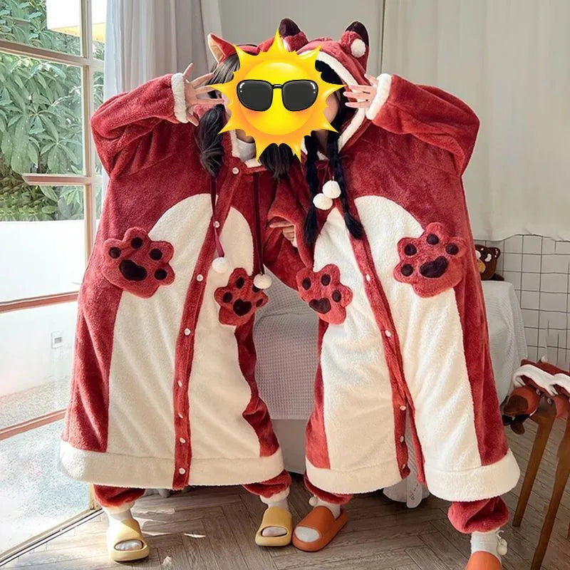 Person wearing a red and white kawaii animal-themed onesie with sun glasses and sunglasses held up.