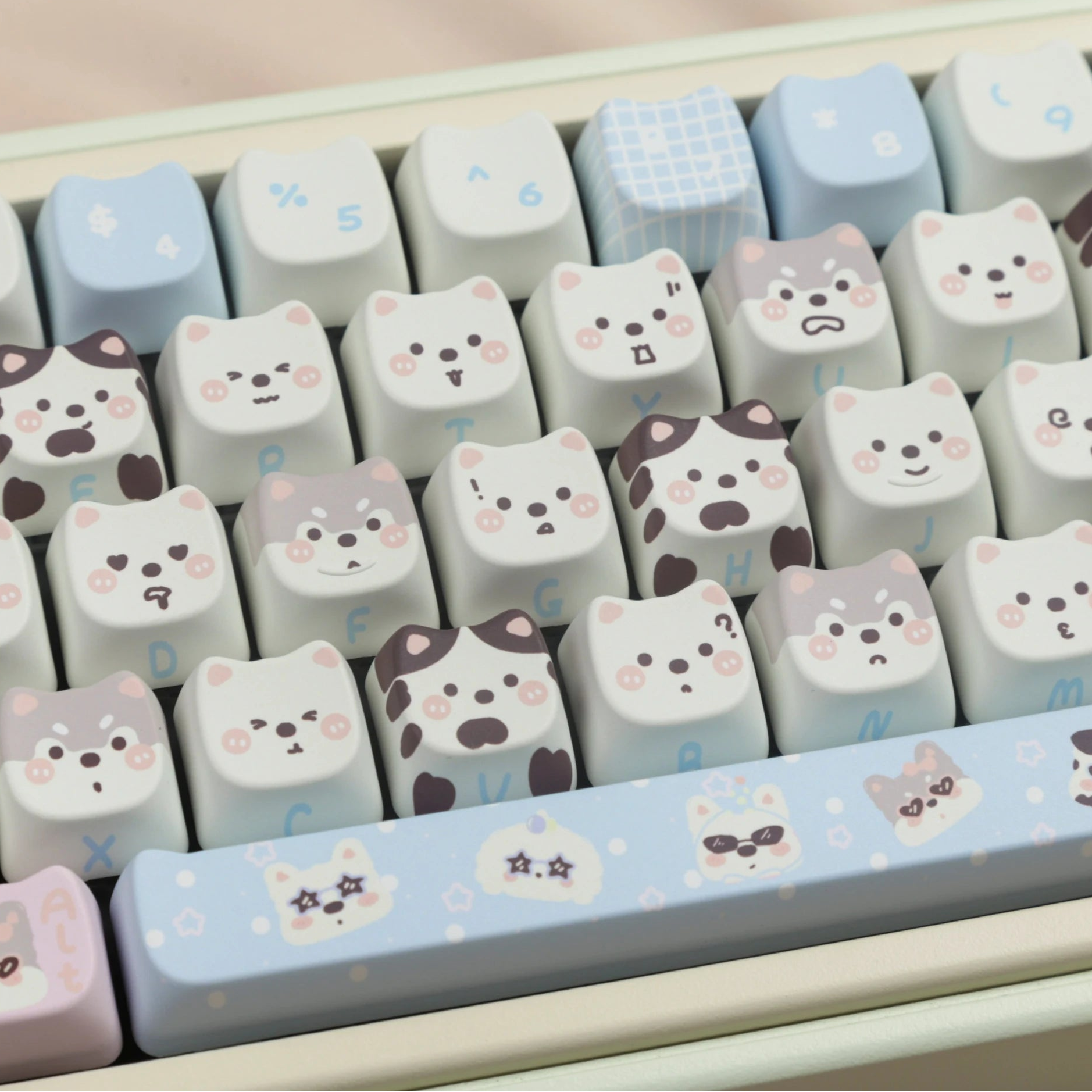 Kawaii keyboard keys with cute animal designs on a light background
