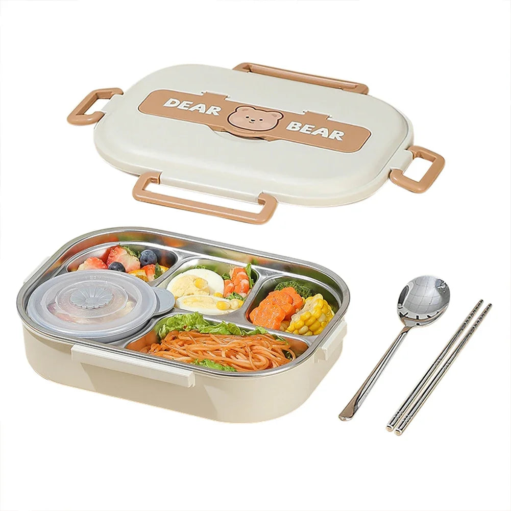 Beige kawaii bento box with compartments filled with food, a spoon, and chopsticks on a white background.