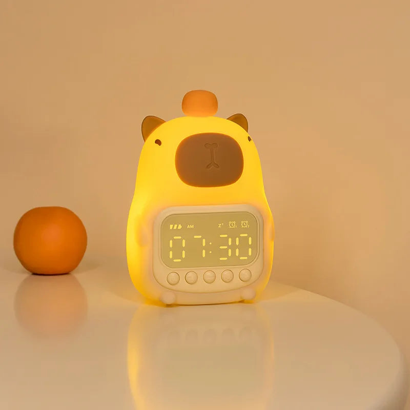Yellow cartoon-style kawaii alarm clock with a small orange object on a beige background