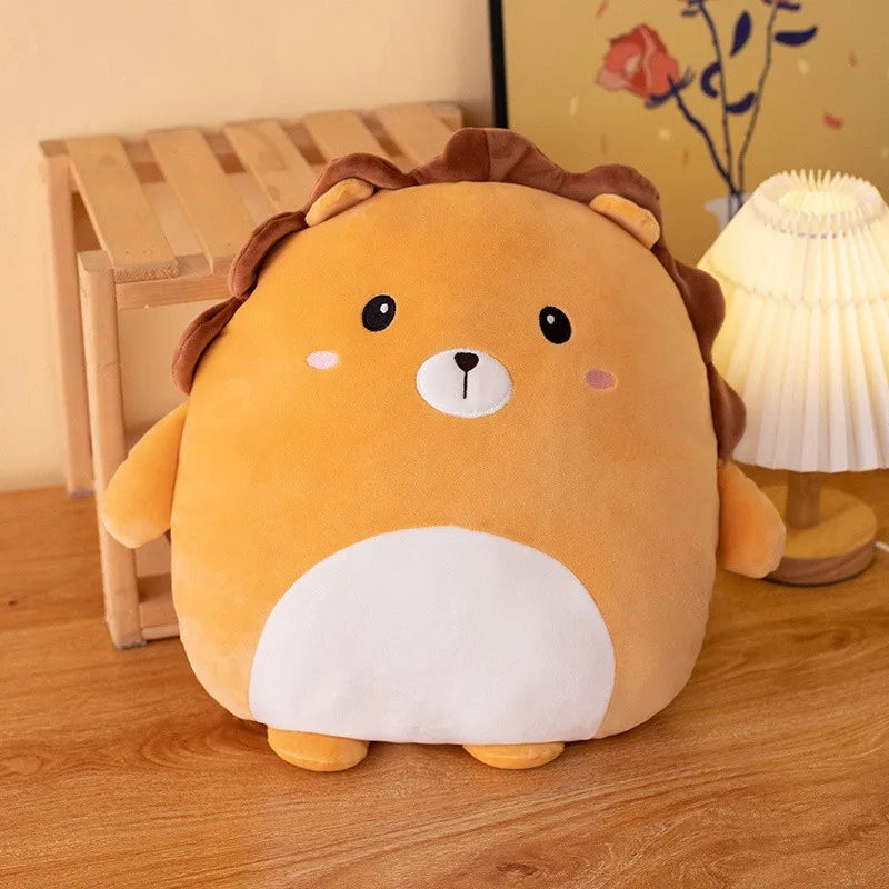 Cute lion-shaped kawaii plush toy on a wooden floor with a lamp and plant in the background.